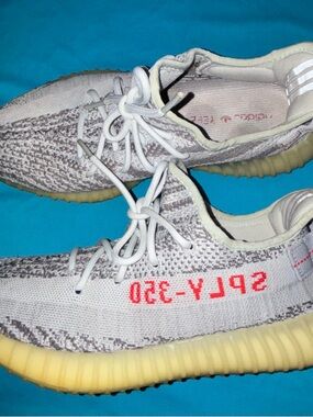 adidas Light Gray Knit Sneakers with Red Accent